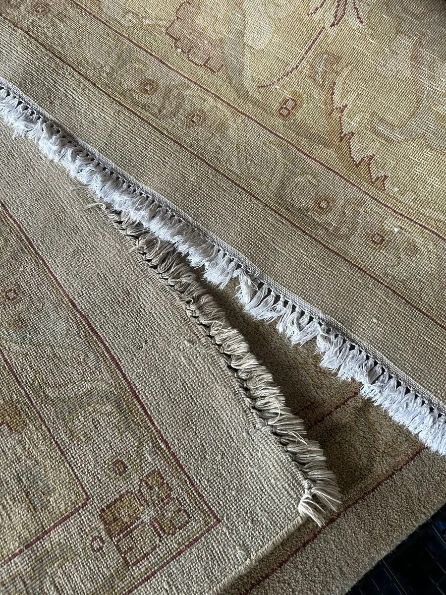 Detalhe da franja de um tapete persa